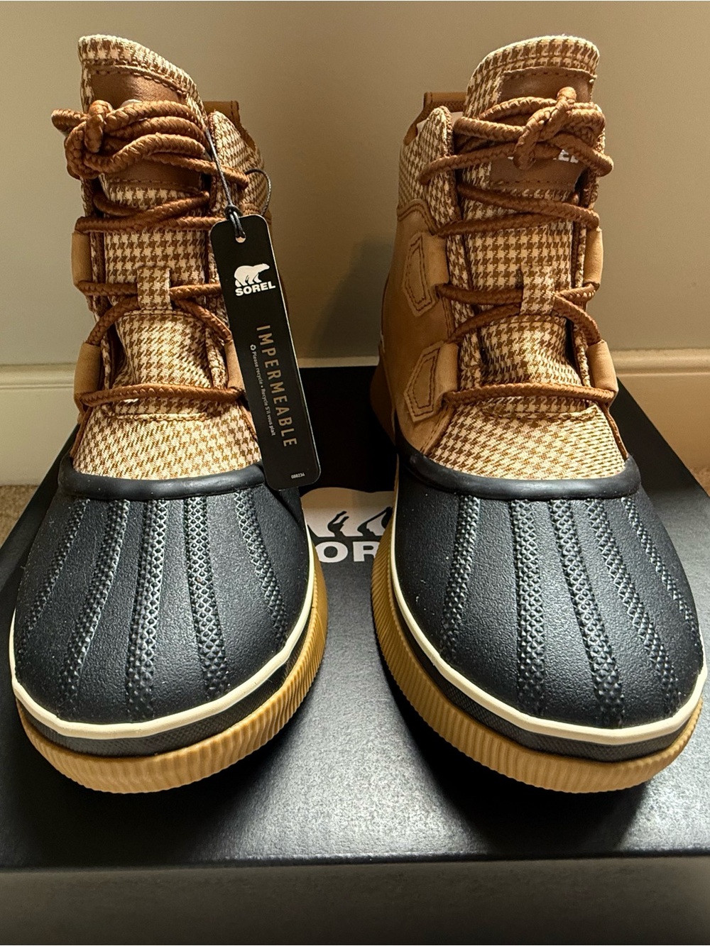Sorel Out N About™ IV Women's Waterproof Boots in Black & Tan